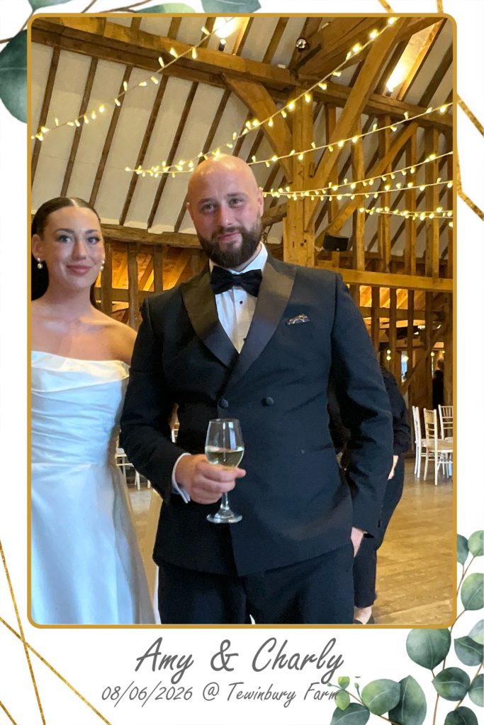 “Wedding guests using Digital Selfie Pod by DJ&SAX DJ‑V at Amy and Charlie’s wedding”